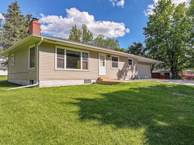 1007 Ruby St NW, Alexandria, MN 56308 - ranch-style house with a chimney, a garage, a front yard, concrete driveway, and entry steps