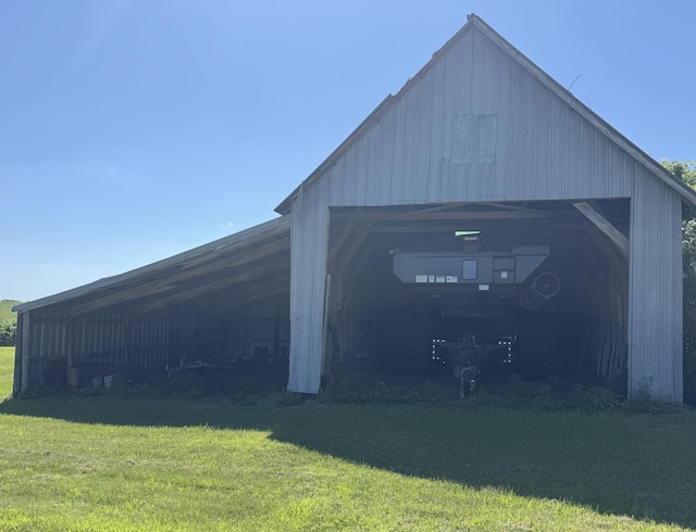 74194 415th St, South Branch Twp, MN 56081 - view of pole building featuring a lawn