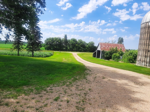 74194 415th St, South Branch Twp, MN 56081 - view of community with a yard and an outdoor structure