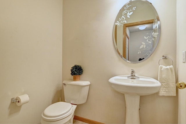 11307 Chisholm Cir NE Unit C, Blaine, MN 55449 - half bathroom with toilet and baseboards
