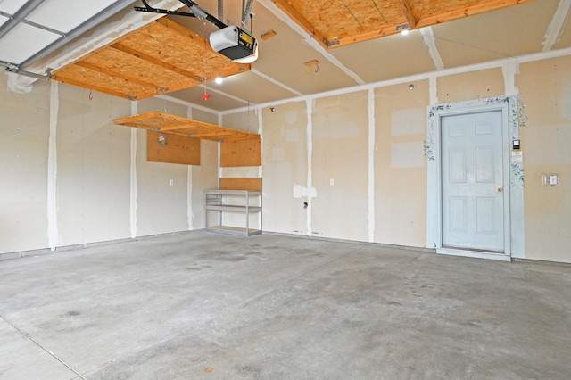11307 Chisholm Cir NE Unit C, Blaine, MN 55449 - garage featuring a garage door opener