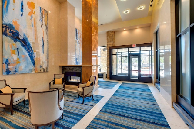 875 Lake St N Unit 318, Wayzata, MN 55391 - community lobby with a towering ceiling and recessed lighting