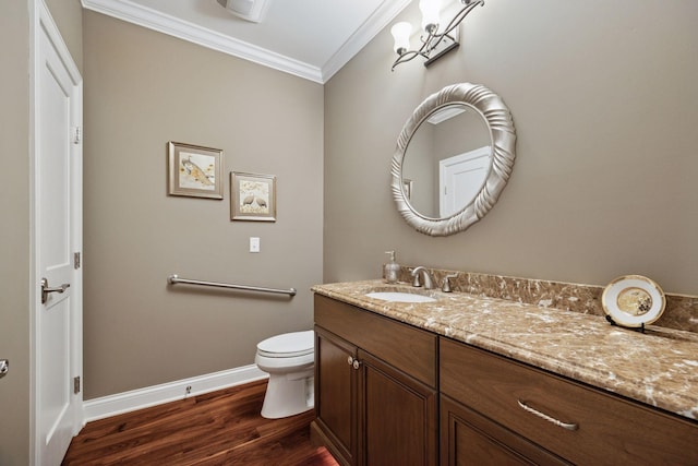 875 Lake St N Unit 318, Wayzata, MN 55391 - bathroom with ornamental molding, vanity, and wood finished floors
