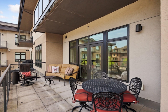 875 Lake St N Unit 318, Wayzata, MN 55391 - patio / terrace featuring an outdoor living space
