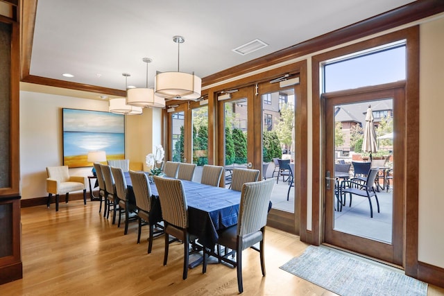875 Lake St N Unit 318, Wayzata, MN 55391 - dining room with light wood-style floors, french doors, and recessed lighting