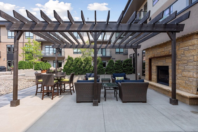 875 Lake St N Unit 318, Wayzata, MN 55391 - view of patio with an outdoor living space with a fireplace, outdoor dining space, and a pergola