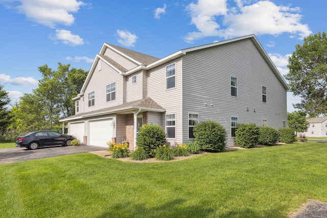 12651 8th Ave S, Zimmerman, MN 55398 - view of home's exterior featuring a garage, asphalt driveway, a lawn, and a shingled roof
