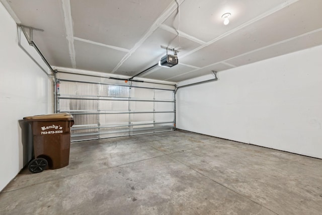 12651 8th Ave S, Zimmerman, MN 55398 - garage featuring a garage door opener