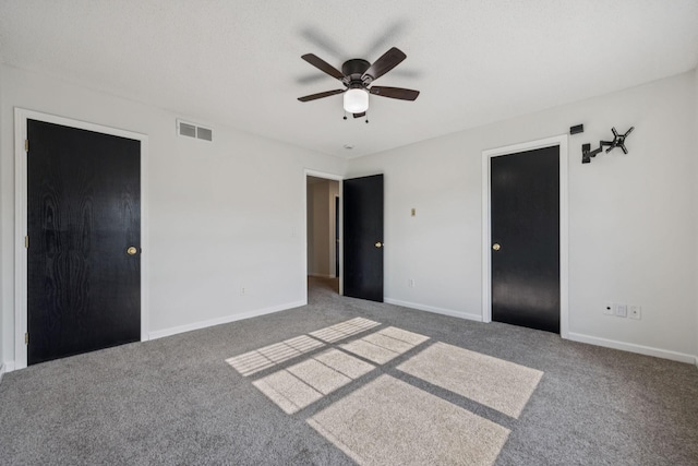 12651 8th Ave S, Zimmerman, MN 55398 - unfurnished bedroom featuring carpet and a ceiling fan