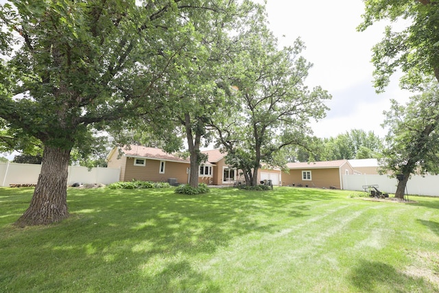 915 Darling Dr NW, Alexandria, MN 56308 - view of yard with a garage