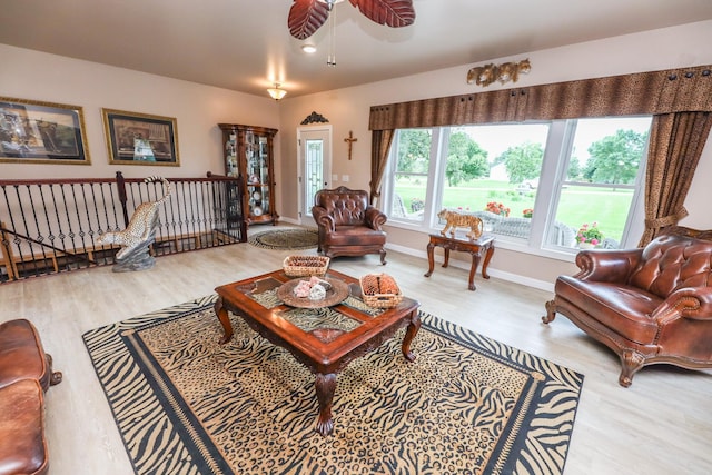 915 Darling Dr NW, Alexandria, MN 56308 - living area with wood finished floors and ceiling fan