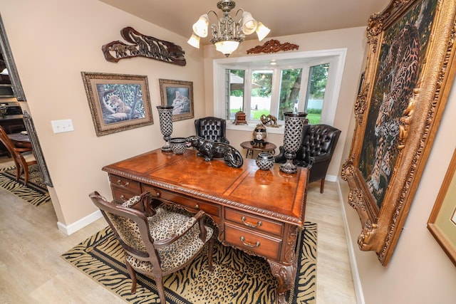 915 Darling Dr NW, Alexandria, MN 56308 - office area featuring a chandelier and light wood-style floors