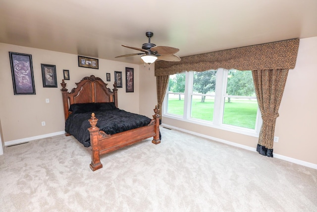 915 Darling Dr NW, Alexandria, MN 56308 - carpeted bedroom with baseboards and a ceiling fan