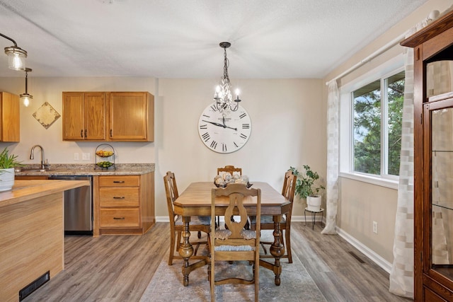 1807 Lachman Ave NE, Saint Michael, MN 55376 - dining space with wood finished floors and a chandelier