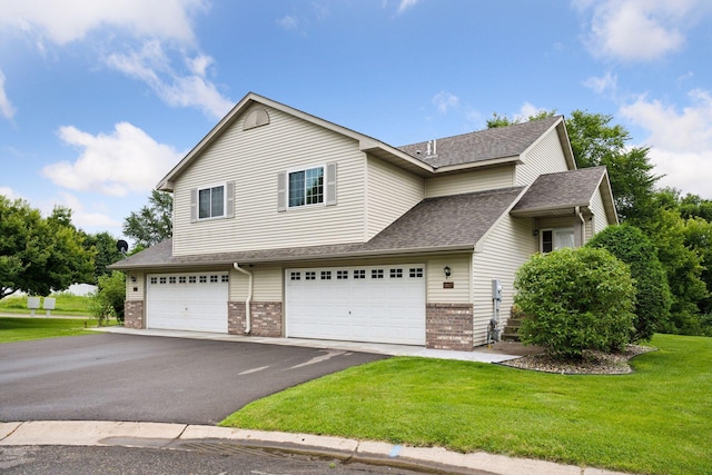 1807 Lachman Ave NE, Saint Michael, MN 55376 - traditional-style home with brick siding, an attached garage, asphalt driveway, a front yard, and roof with shingles