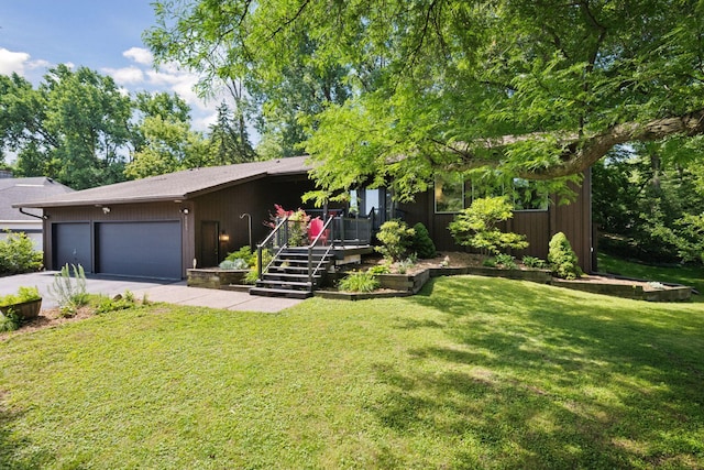 6205 Saint Albans Cir, Edina, MN 55439 - view of front of house with driveway, an attached garage, a front yard, and a wooden deck