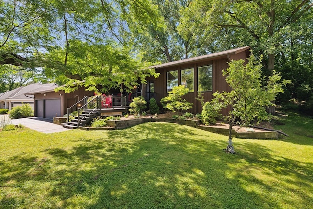 6205 Saint Albans Cir, Edina, MN 55439 - view of front of home featuring a wooden deck, a front lawn, a garage, and driveway