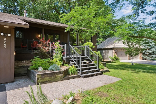6205 Saint Albans Cir, Edina, MN 55439 - view of front facade with a front lawn and an outbuilding