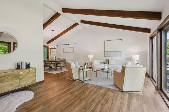 6205 Saint Albans Cir, Edina, MN 55439 - living room featuring light wood-type flooring, beam ceiling, a chandelier, and high vaulted ceiling