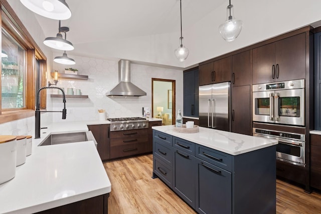 6205 Saint Albans Cir, Edina, MN 55439 - kitchen with appliances with stainless steel finishes, wall chimney exhaust hood, open shelves, light countertops, and backsplash