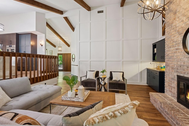 6205 Saint Albans Cir, Edina, MN 55439 - living area with a decorative wall, a chandelier, beamed ceiling, dark wood finished floors, and high vaulted ceiling