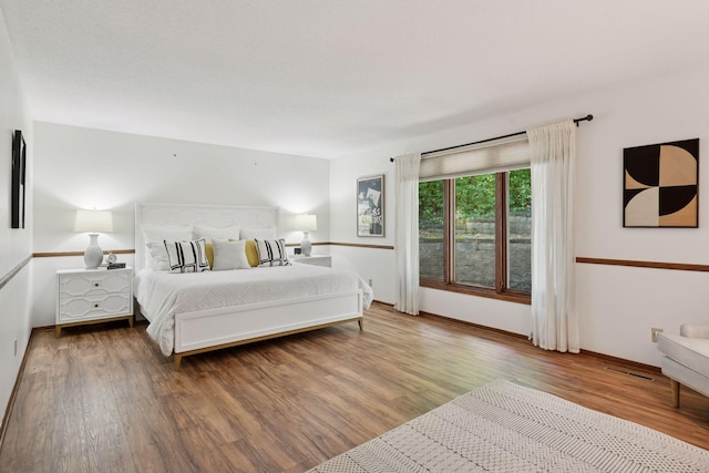 6205 Saint Albans Cir, Edina, MN 55439 - bedroom with wood finished floors and baseboards