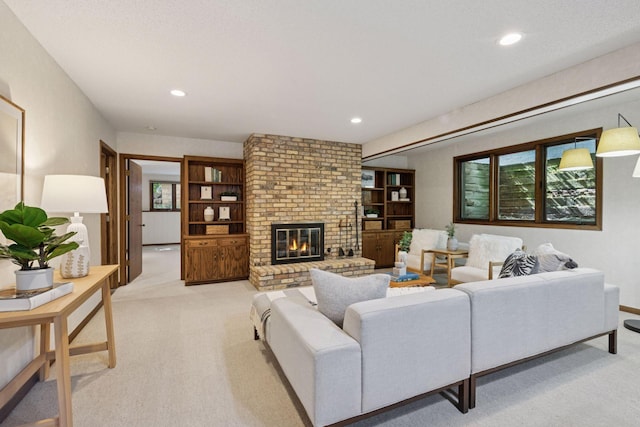 6205 Saint Albans Cir, Edina, MN 55439 - living area featuring light colored carpet, recessed lighting, and a fireplace