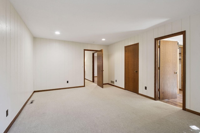 6205 Saint Albans Cir, Edina, MN 55439 - unfurnished bedroom featuring carpet, recessed lighting, and wood walls