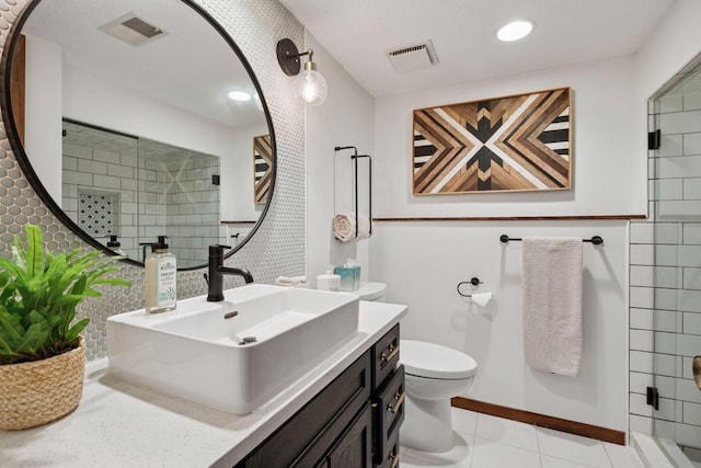 6205 Saint Albans Cir, Edina, MN 55439 - bathroom with vanity, a tile shower, recessed lighting, and tile patterned flooring