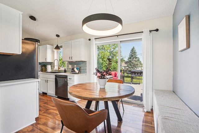 1209 Walnut St, Farmington, MN 55024 - dining area with wood finished floors