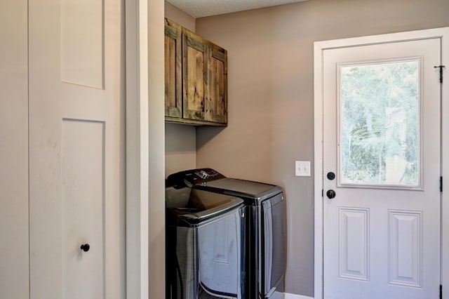 38391 Hunters Ridge Trl, North Branch, MN 55056 - washroom featuring separate washer and dryer and cabinet space