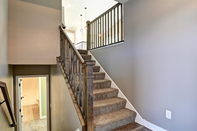 38391 Hunters Ridge Trl, North Branch, MN 55056 - staircase with baseboards
