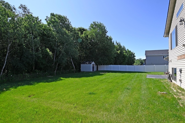 38391 Hunters Ridge Trl, North Branch, MN 55056 - fenced backyard featuring a shed