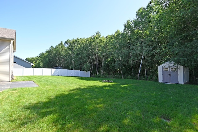 38391 Hunters Ridge Trl, North Branch, MN 55056 - fenced backyard featuring a storage unit