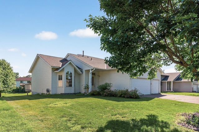 7217 92nd Trl N, Brooklyn Park, MN 55445 - ranch-style house with concrete driveway, a front yard, and roof with shingles