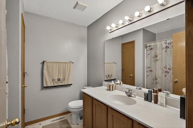 7217 92nd Trl N, Brooklyn Park, MN 55445 - full bath featuring vanity, a textured ceiling, tile patterned floors, and curtained shower