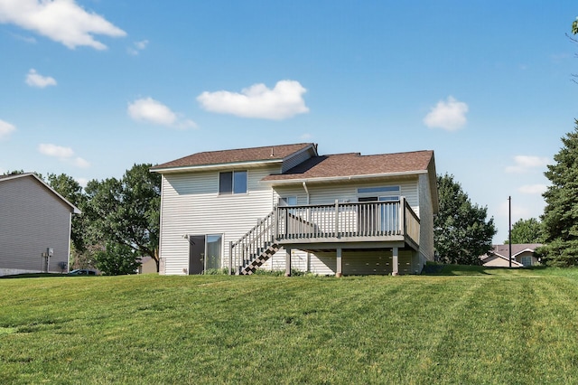 7217 92nd Trl N, Brooklyn Park, MN 55445 - back of property featuring a deck, a yard, and stairway