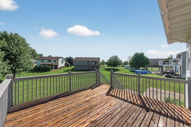 7217 92nd Trl N, Brooklyn Park, MN 55445 - wooden terrace with a residential view and a lawn