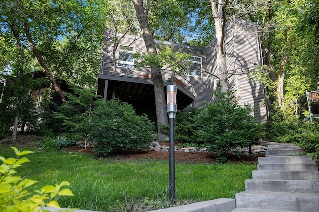 1921 Ewing Ave S, Minneapolis, MN 55416 - view of front of home with stairs and a chimney