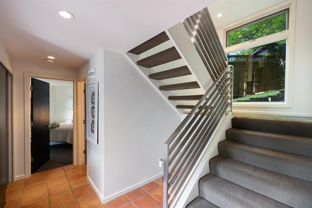 1921 Ewing Ave S, Minneapolis, MN 55416 - stairs featuring tile patterned floors and recessed lighting