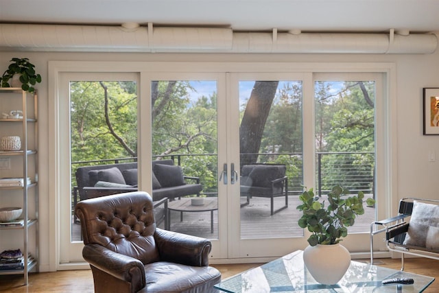 1921 Ewing Ave S, Minneapolis, MN 55416 - living area featuring healthy amount of natural light and light wood-style flooring