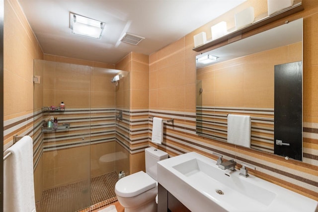 1921 Ewing Ave S, Minneapolis, MN 55416 - bathroom with a stall shower, tile walls, and vanity