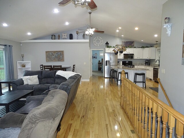 568 Midway Rd, Menomonie, WI 54751 - living room featuring ceiling fan, light wood-type flooring, recessed lighting, and high vaulted ceiling