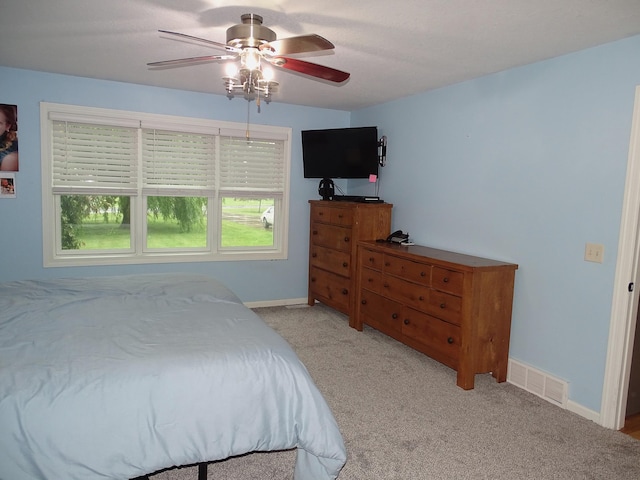568 Midway Rd, Menomonie, WI 54751 - carpeted bedroom featuring baseboards and ceiling fan