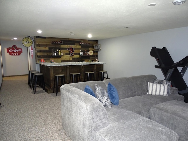 568 Midway Rd, Menomonie, WI 54751 - living area featuring bar area, recessed lighting, and carpet flooring