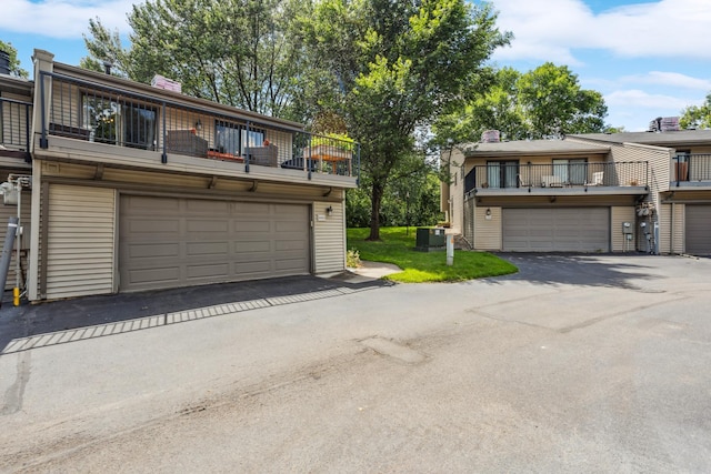 4463 Arden View Ct, Arden Hills, MN 55112 - townhome / multi-family property with a balcony, a chimney, and a garage