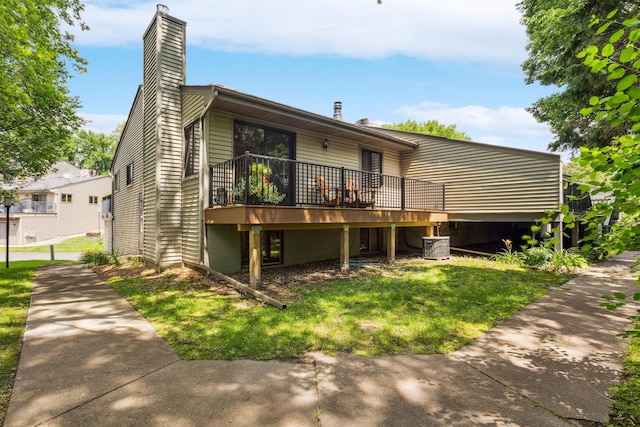4463 Arden View Ct, Arden Hills, MN 55112 - rear view of house with a chimney, a deck, and a yard