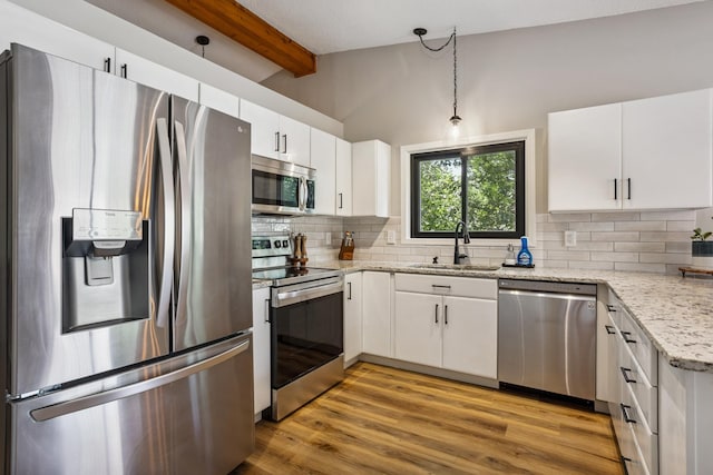 4463 Arden View Ct, Arden Hills, MN 55112 - kitchen featuring stainless steel appliances, decorative backsplash, light stone counters, white cabinetry, and beamed ceiling