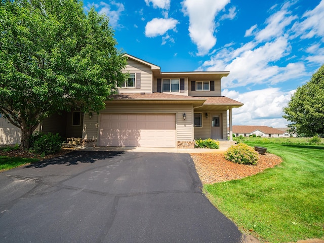 519 Graceview Loop, Saint Joseph, MN 56374 - view of front of house with an attached garage, driveway, and a front yard