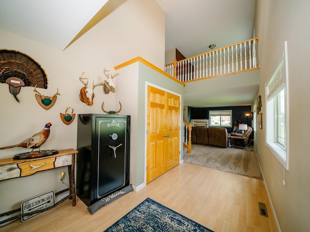 519 Graceview Loop, Saint Joseph, MN 56374 - stairway featuring wood finished floors and a towering ceiling